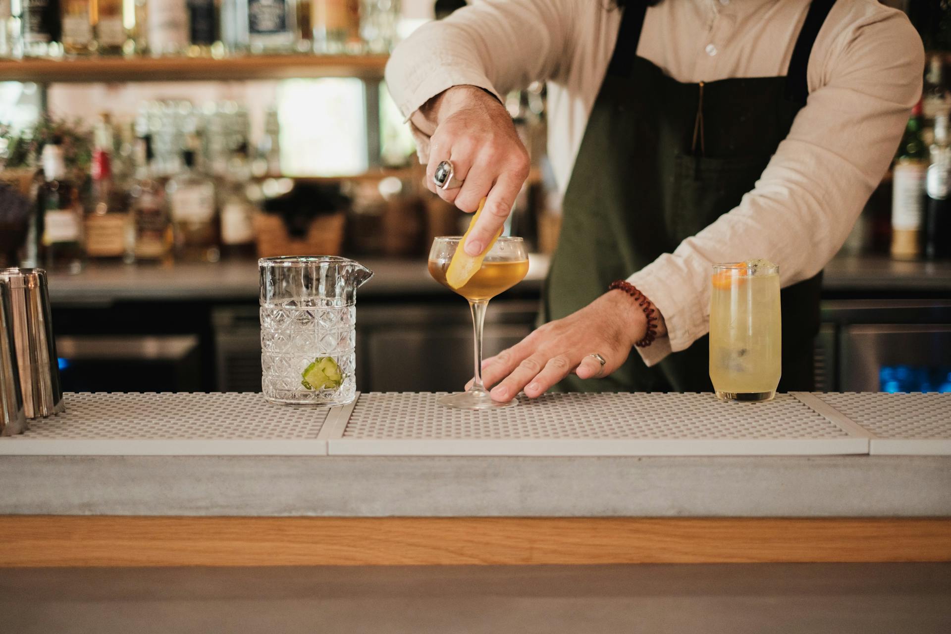 Cardamom Sour cocktail being garnished at Marina 29 bar