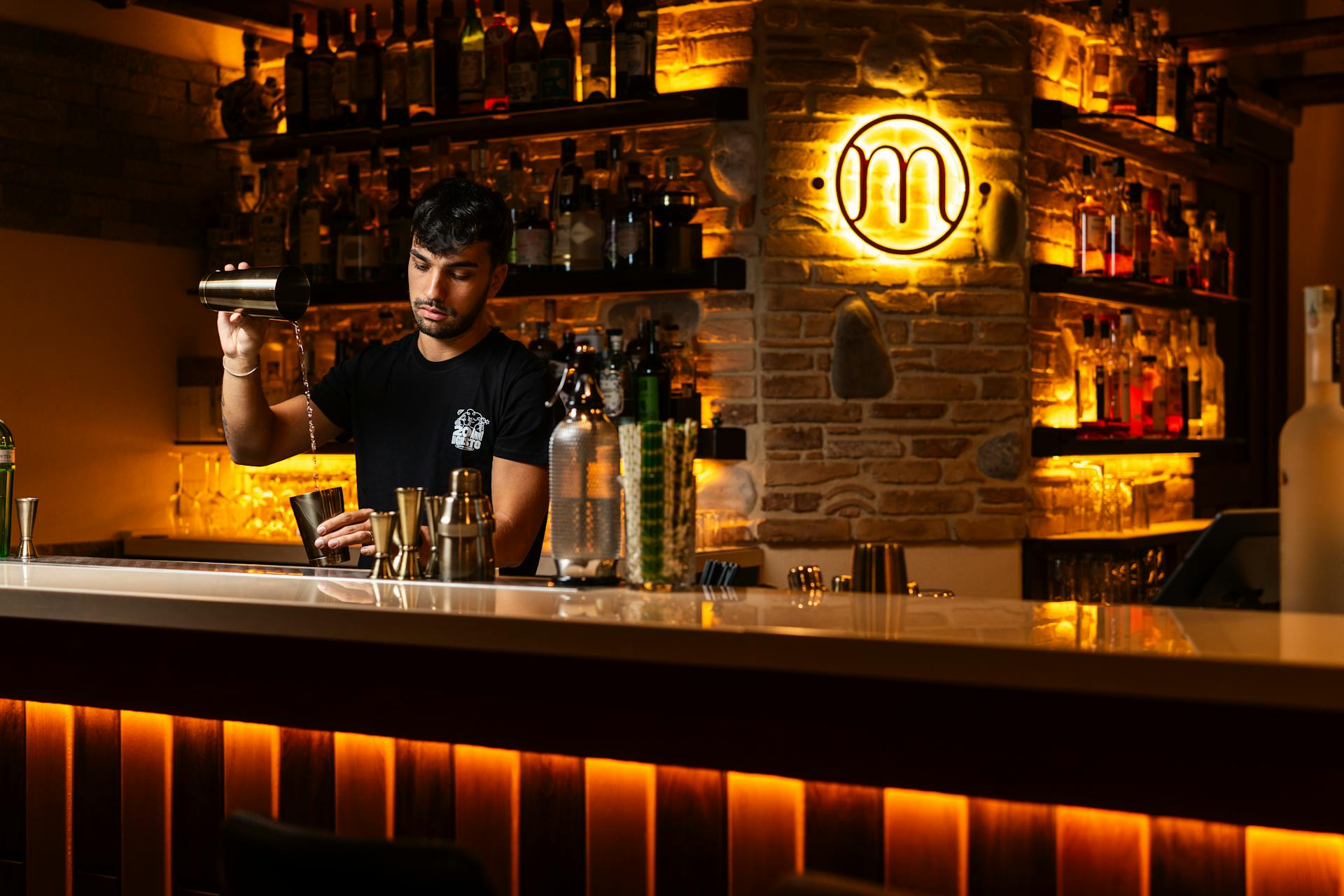 Mixology team at Marina 29 — pouring at the bar counter